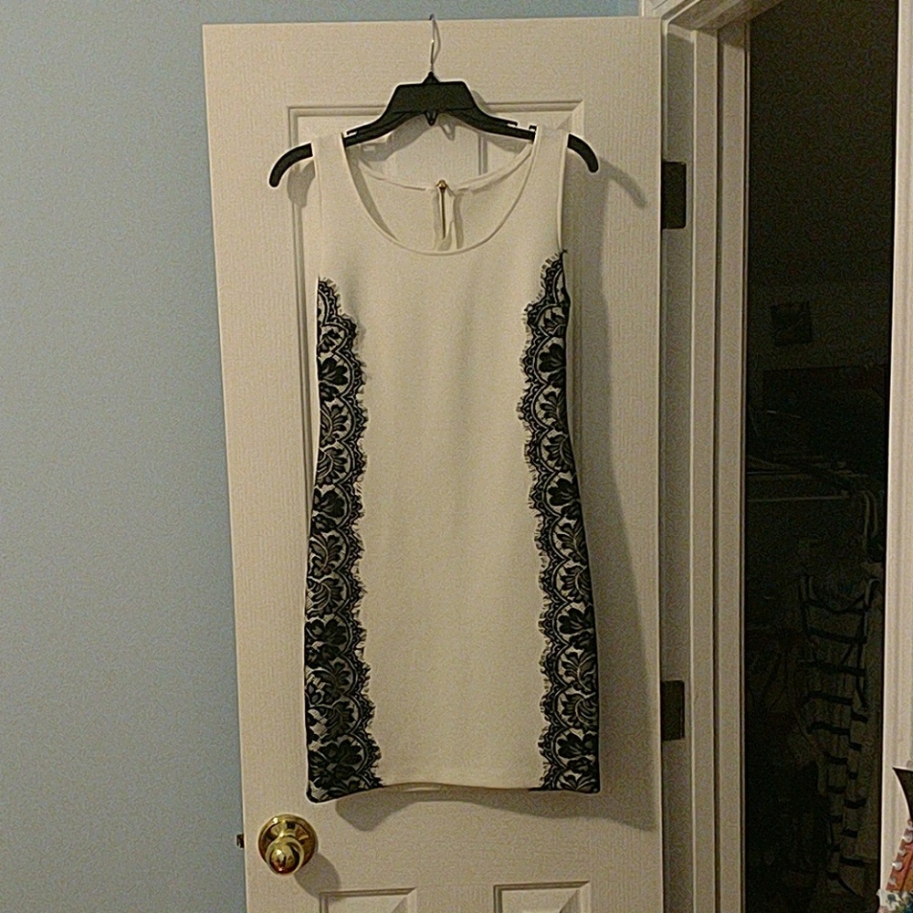 White mini dress with black lace